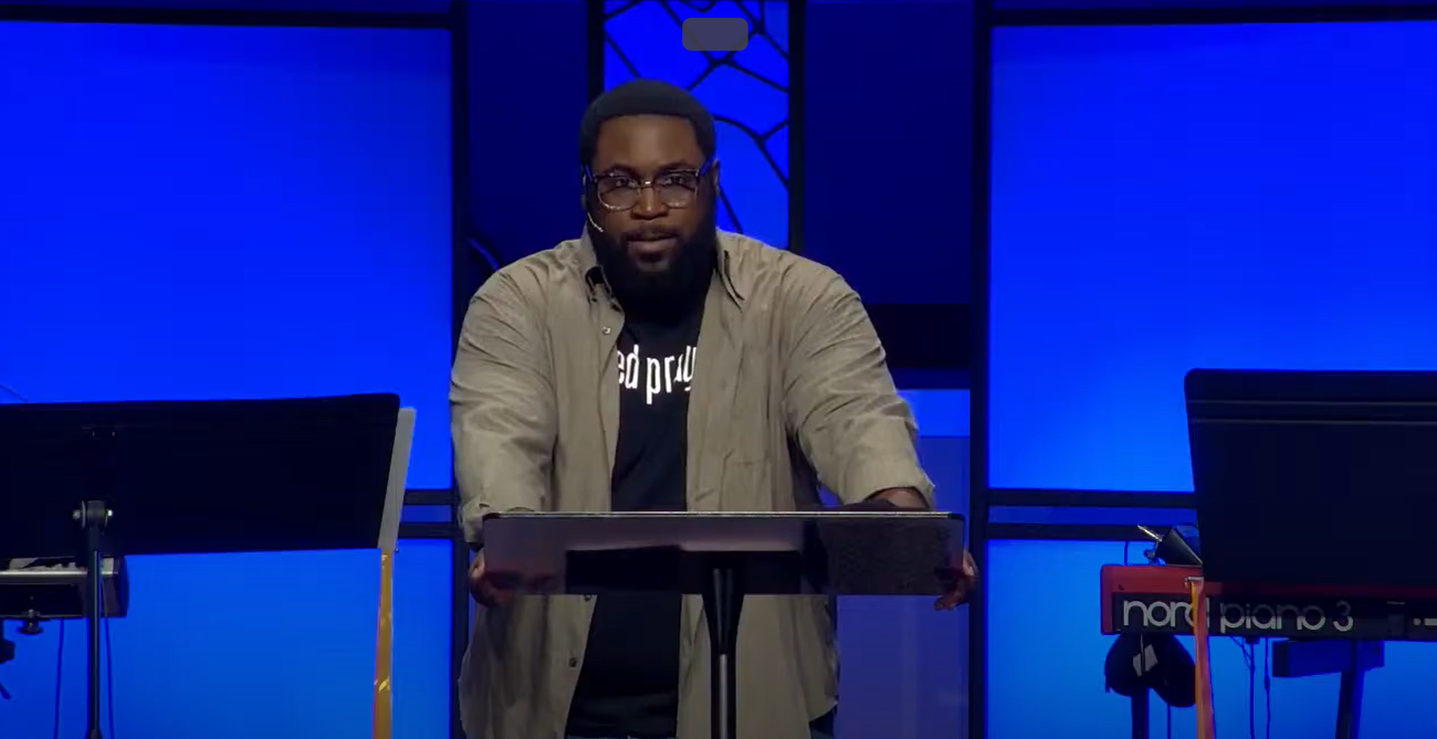Devin Calhoun speaking at church